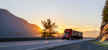 Truck traveling the route at sunset