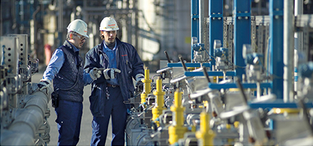 Industrial plant with two men