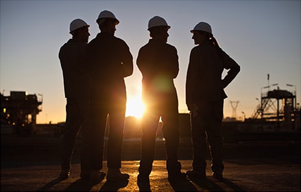 Industrial workers in a group setting