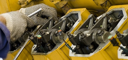 Natural Gas Pipeline equipment close up with engineer hands