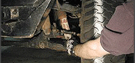 Adjust by loosening the tie-rod adjuster sleeves