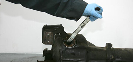 Pry the old axle seal out of the differential or transmission Pry the old axle seal out of the differential or transmission