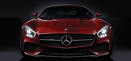 Red Mercedes Benz head-on view.