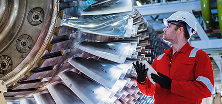 Engineer assessing turbine