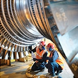 Engineers working on turbine