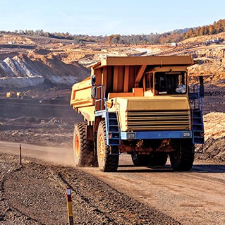 yellow truck at mining site